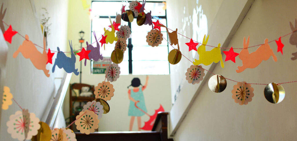 Hanging decorations in a school stairwell