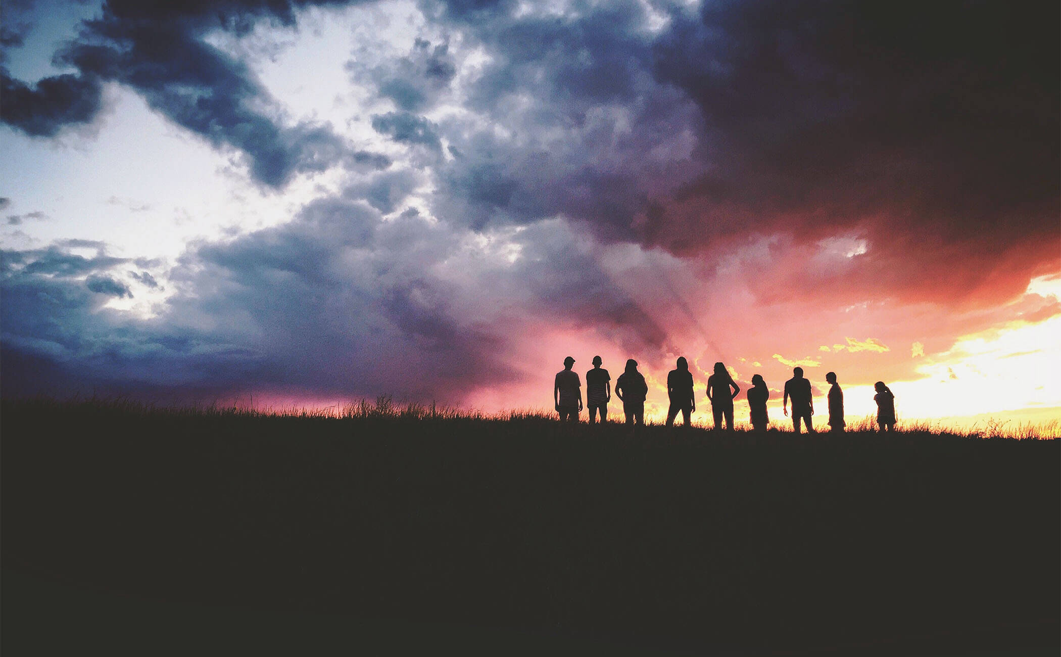 Foundation marketing research to support a legacy, silhouettes looking out on a sunset