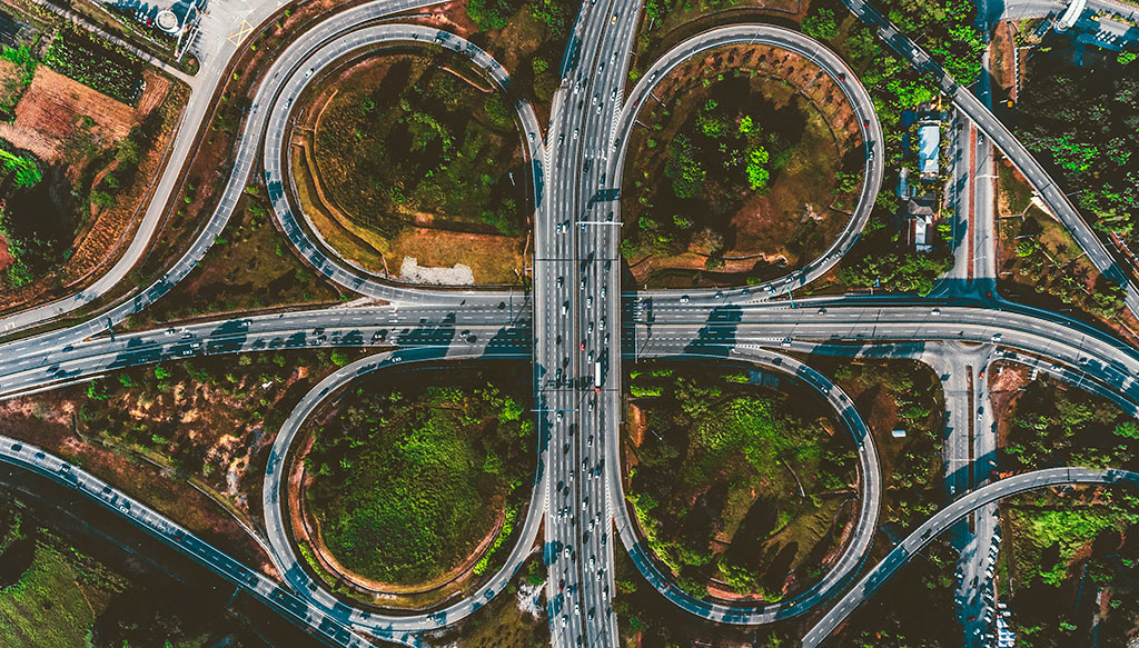 The concept of Industry intersections illustrated by a looping intersection of highways in Malaysia