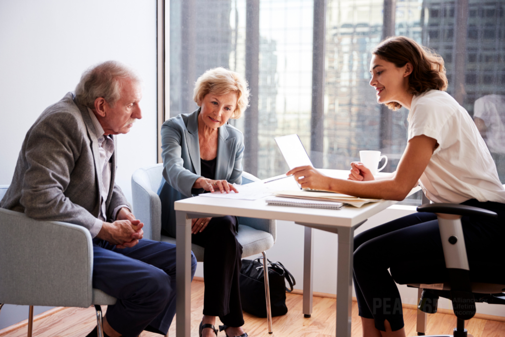 older couple speaks with financial professional